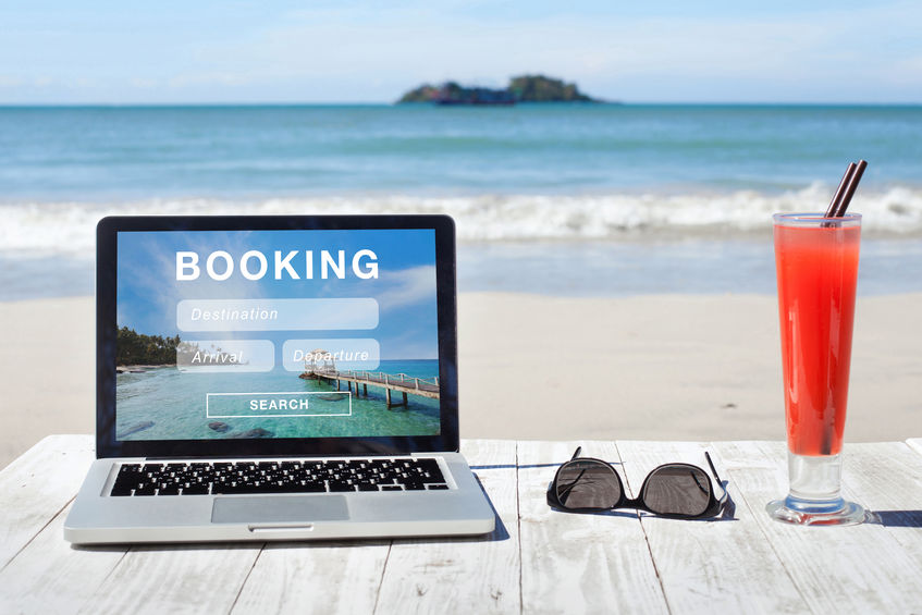 travel booking, hotels and flights reservation on the screen of computer